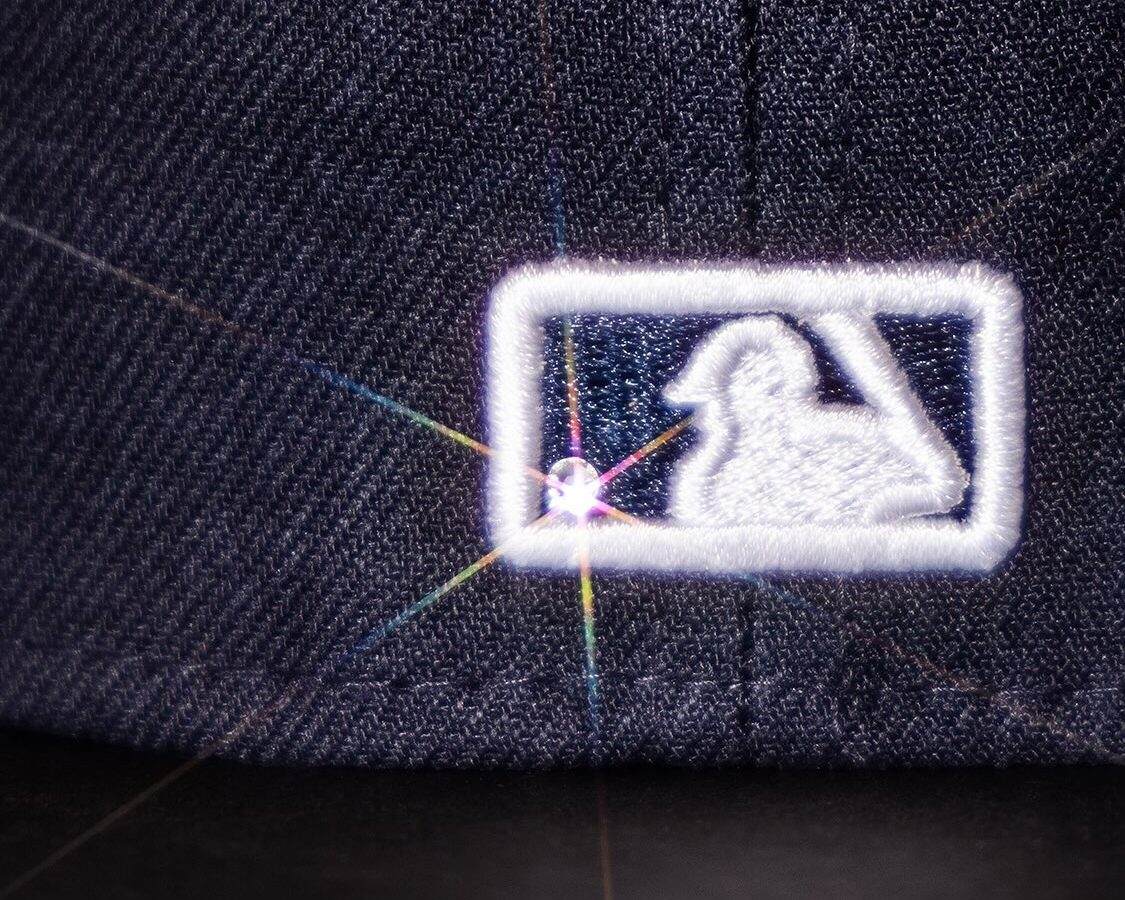 New Era® 携手 Swarovski 推出 2026 春夏联名系列