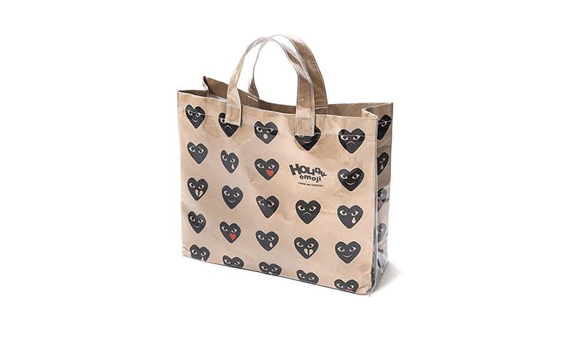 带有 COMME des GARÇONS 表情包的单品来了